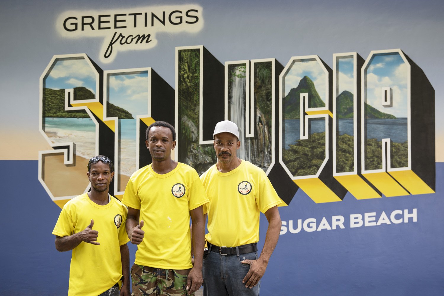 Local contractors in front of St. Lucia Mural